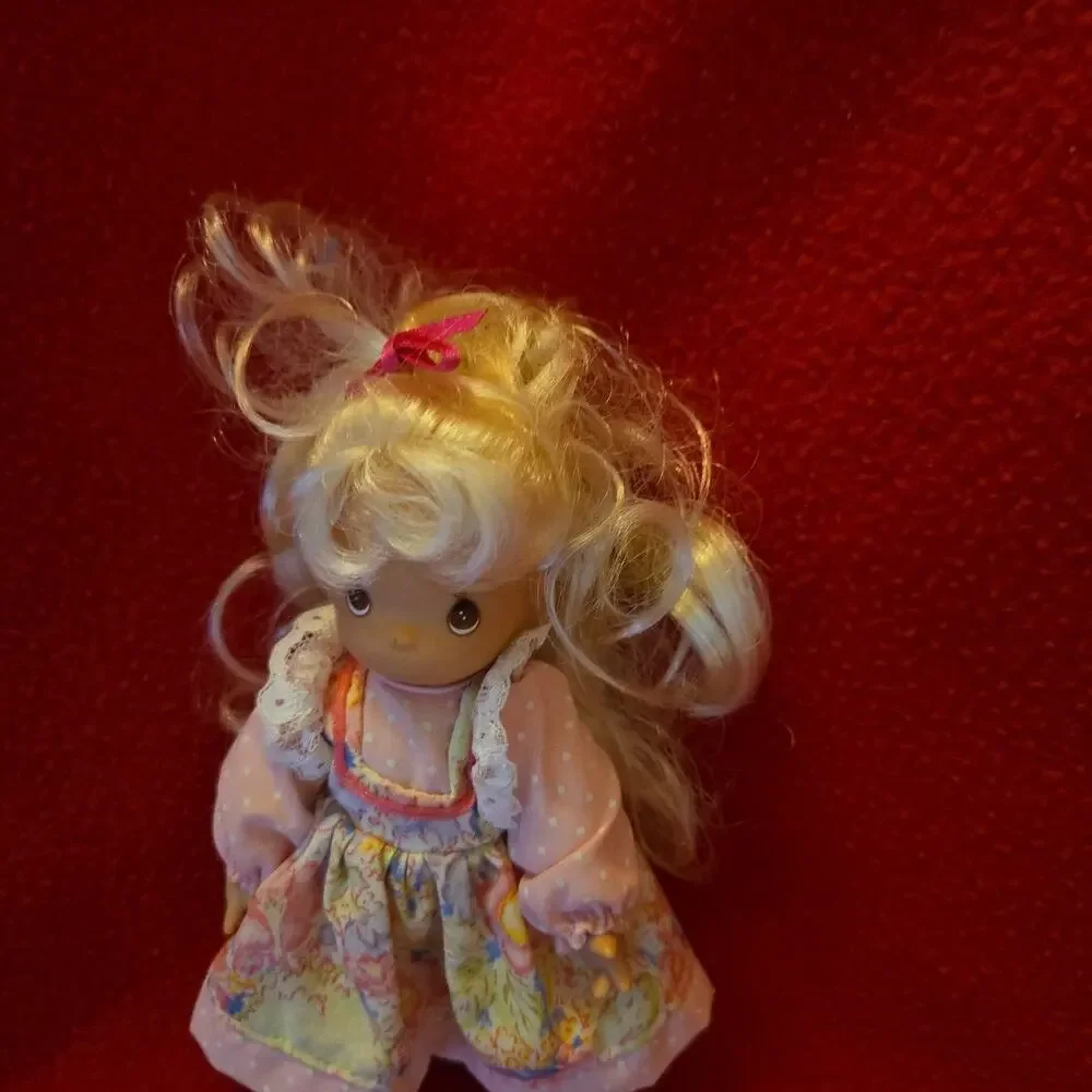 Vintage 2000 Precious Moments 5” doll.